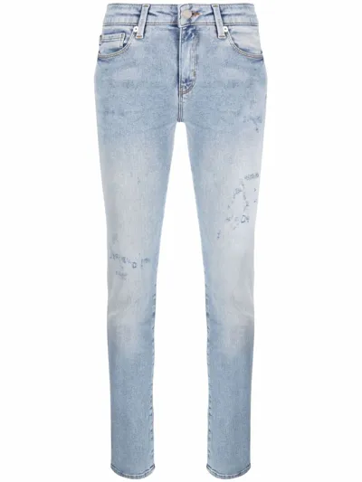 Love Moschino Distressed-effect Skinny Jeans In Blau