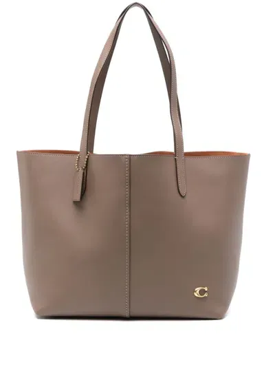 Coach Logo-charm Tote Bag In Brown