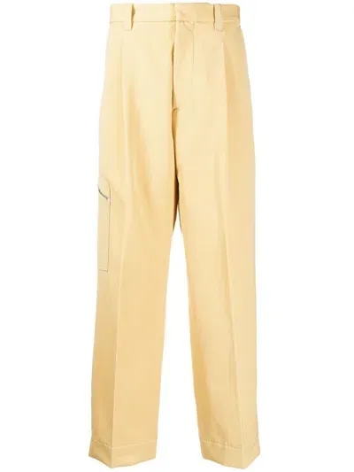 Oamc Straight-leg Pressed-crease Trousers In Yellow