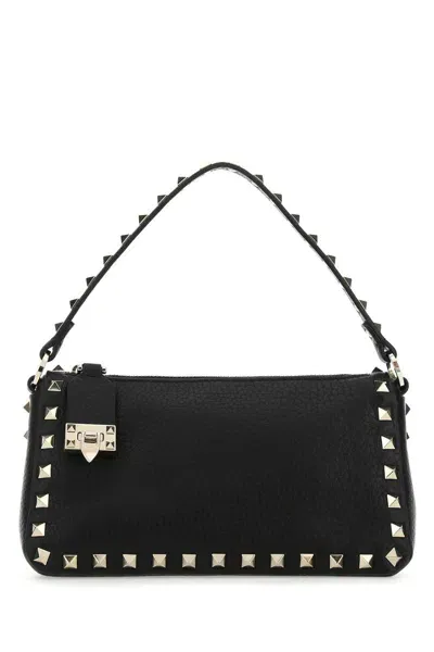 Valentino Garavani Handbags. In Black