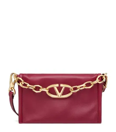 Valentino Garavani Vlogo Chain Leather Clutch Bag In Red